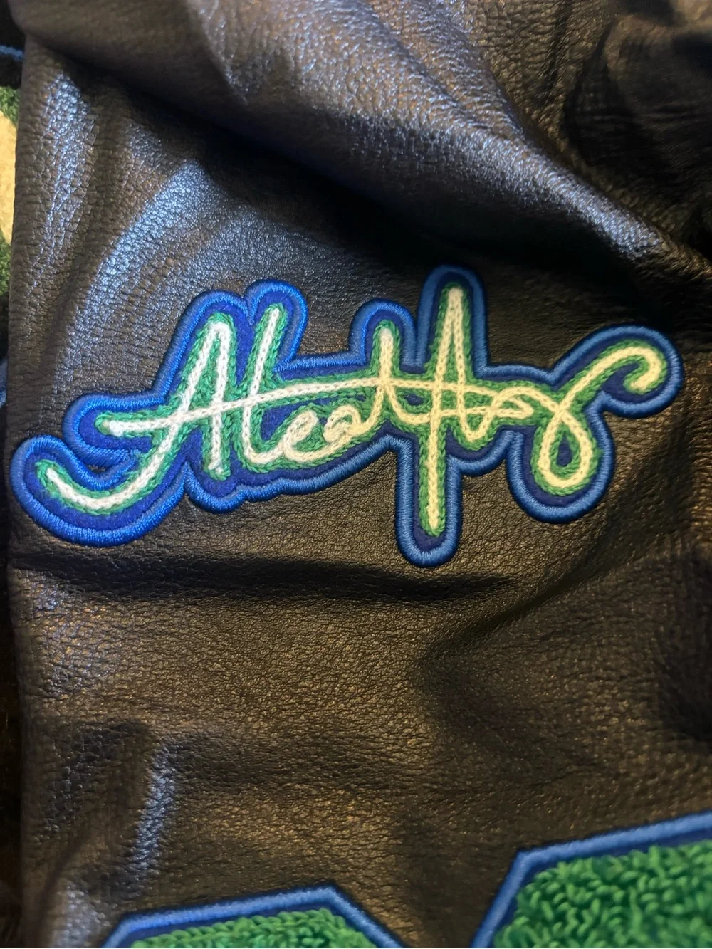 Jordan Black Bomber Jacket with Green Air Jordan Patch